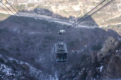 High angle view of cable car over mountains