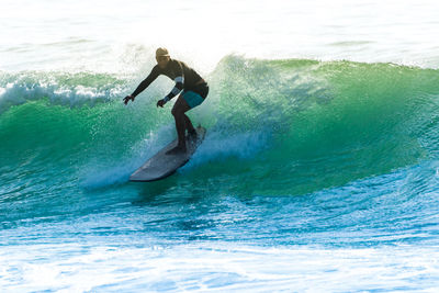 Man surfing in sea