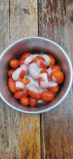 High angle view of fruits in bowl on table