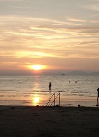 Scenic view of sea at sunset