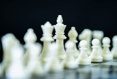 Close-up of chess pieces against blurred background