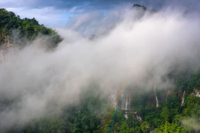 Fog and rainbow in front of thi lo su waterfall, umphang national park, tak, thailand.