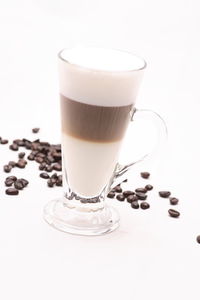 Close-up of coffee cup against white background