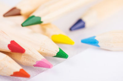 High angle view of colored pencils on table