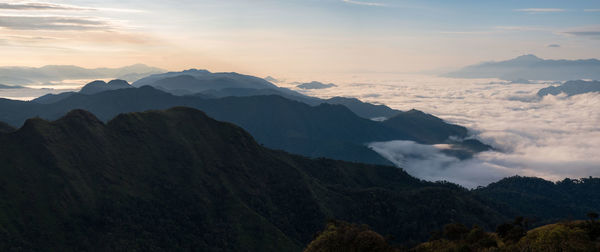 Scenic view of mountains against sky during sunset