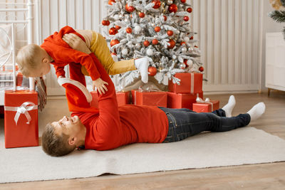 Portrait of woman sitting on table