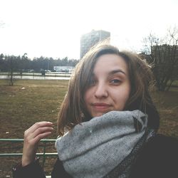 Portrait of young woman in park