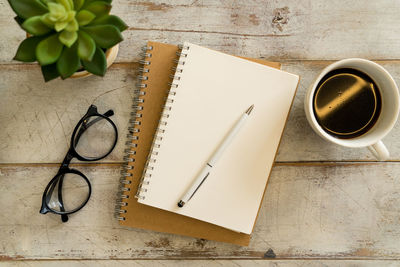 High angle view of coffee cup on table