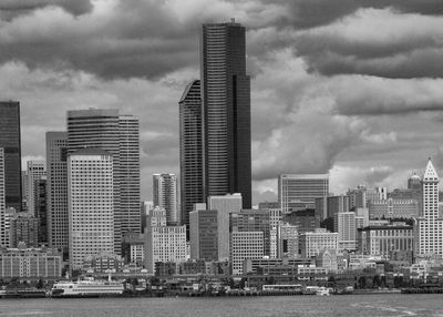 Modern buildings in city against sky