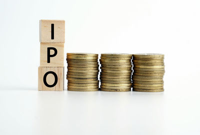 Stack of coins on white background