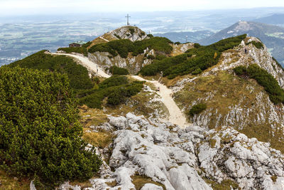 Scenic view of sea and mountains against sky