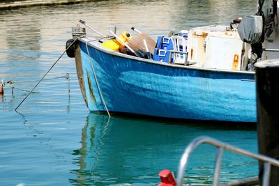 Side view of a cropped boat in water