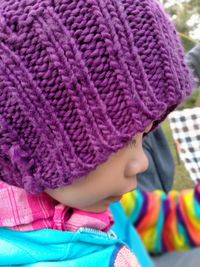 Close-up of girl wearing knit hat