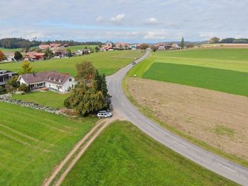 High angle view of road amidst buildings