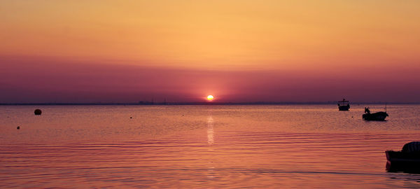 Scenic view of sea during sunset