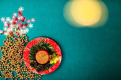 High angle view of red berries on table