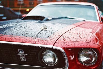 Close-up of raindrops on car