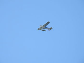 Helicopter against clear blue sky