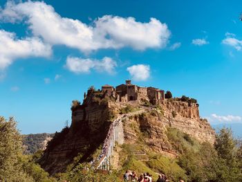 Low angle view of old ruins against sky