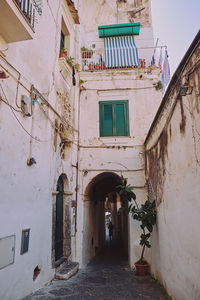 Alley amidst buildings in town