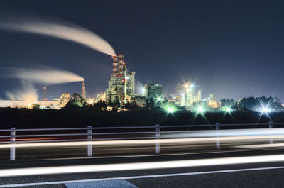 High angle view of light trails on road at night