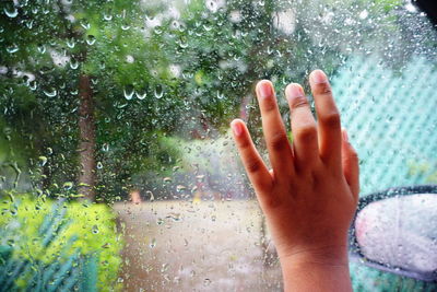 Close-up of raindrops on glass window