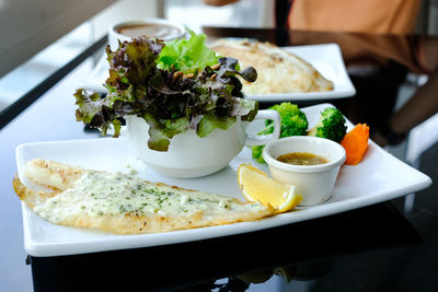 Close-up of served food in plate