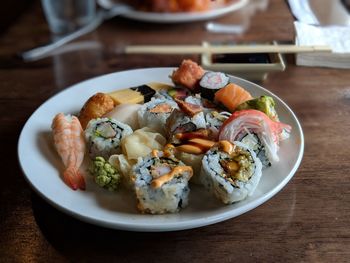 High angle view of japanese food in plate on table