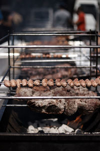 Close-up of meat on barbecue grill