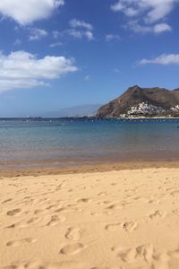 Scenic view of beach against sky