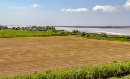 Scenic view of land against sky