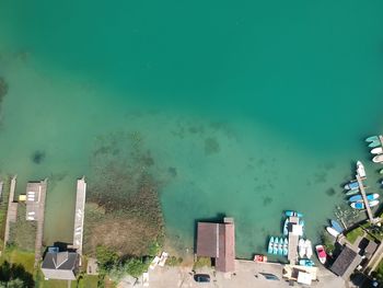 High angle view of buildings by sea