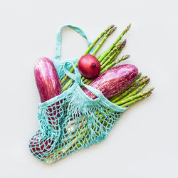 Close-up of multi colored candies against white background