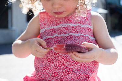 Close-up of girl holding ice cream