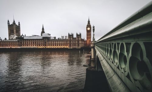 View of bridge over river in city