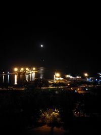 Reflection of illuminated buildings in water