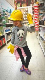 Cute girl playing with umbrella