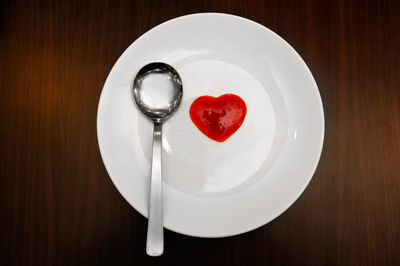 Directly above shot of heart shape in plate on table