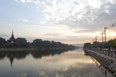 Mandalay's old city walled and water canal during sunrise
