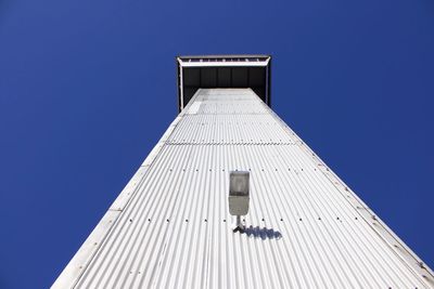 Low angle view of building against blue sky