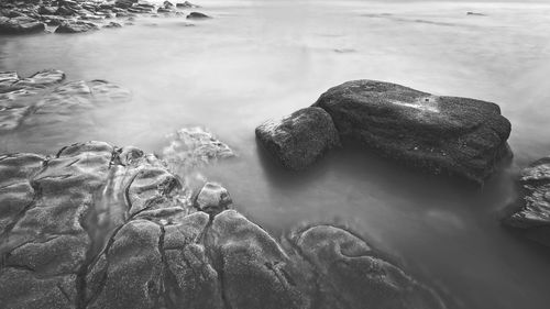 High angle view of rocks in sea