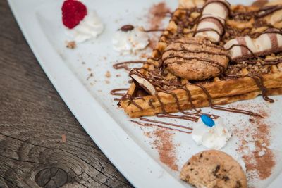 High angle view of cake in plate on table