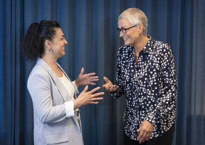 Businesswomen talking together