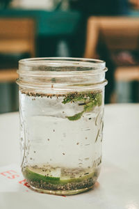 Close-up of glass jar on table