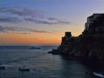 Scenic view of sea at sunset