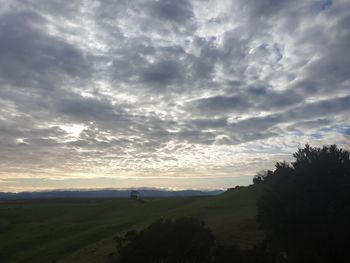 Scenic view of landscape against sky during sunset