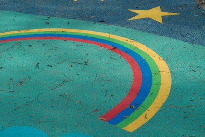 High angle view of multi colored umbrella on street