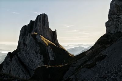 Panoramic view of rock formations against sky