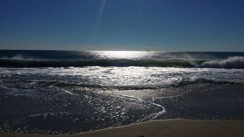 Scenic view of sea against clear sky