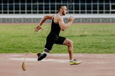 Full length of man running